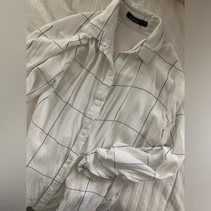 White button up with thin navy stripes